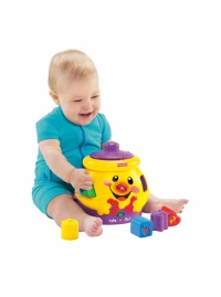 5. Mattel Fisher Price Garnuszek na Klocuszek K0428