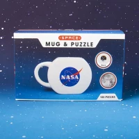 4. Zestaw Prezentowy NASA: Kubek + Puzzle 100 elementów